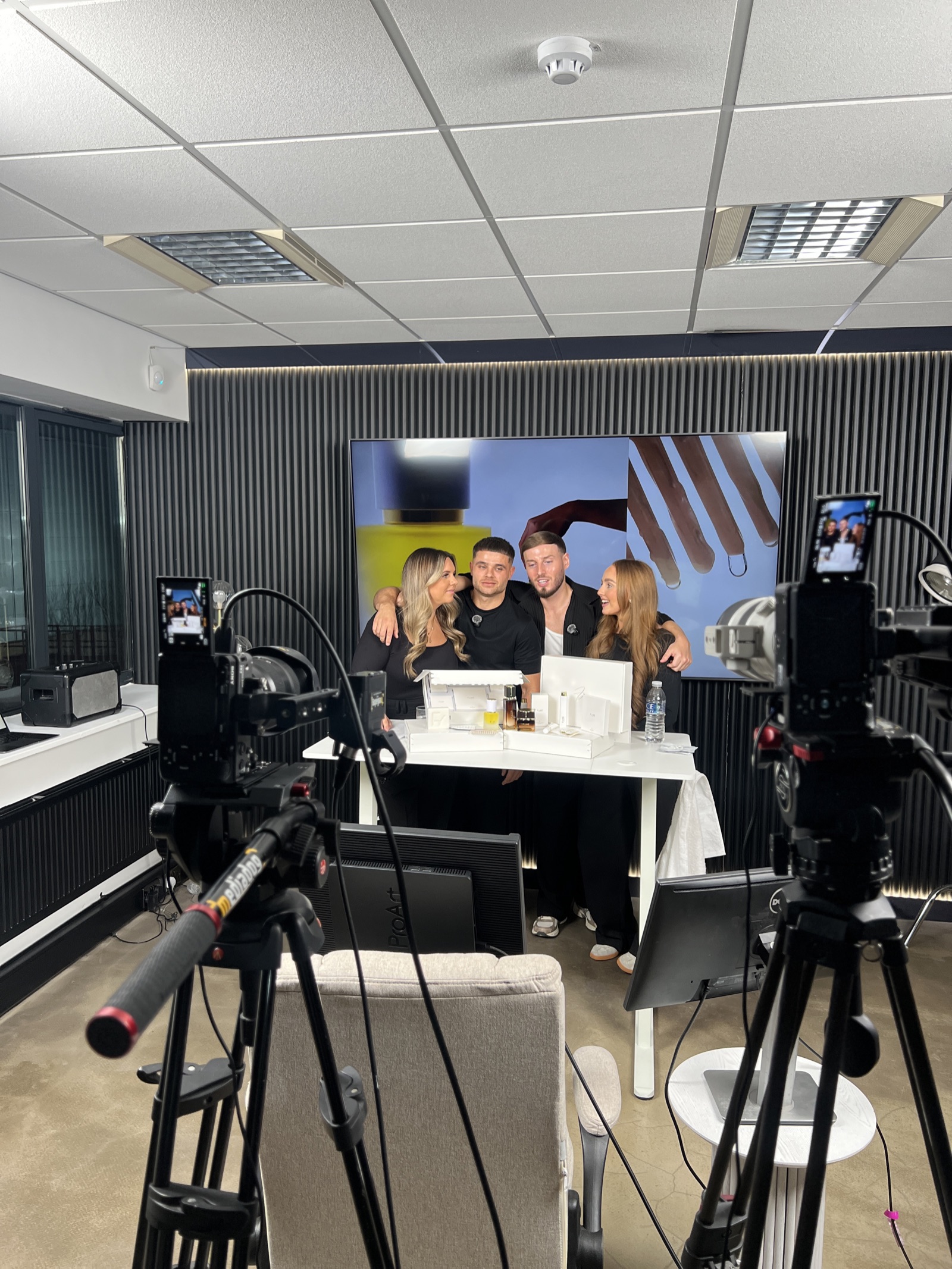 A Somerce crew broadcasting a daily LIVE from the desk, two cameras rolling
