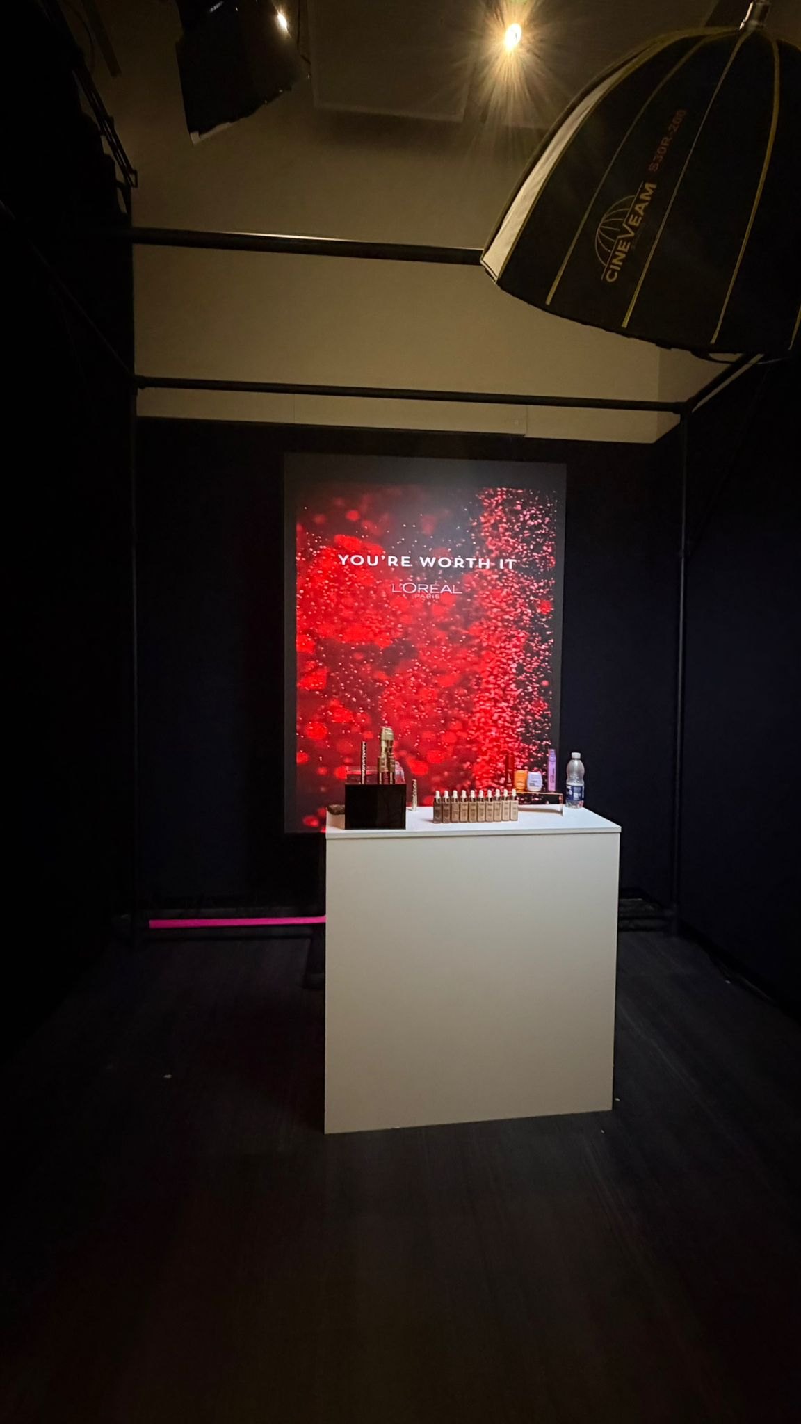 A L'Oréal Paris brand-takeover set lit for broadcast