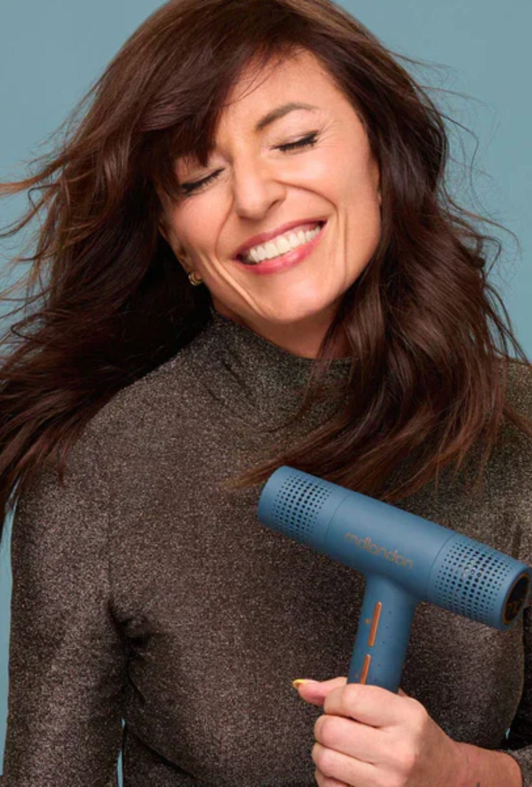 mdlondon hair dryer styling a model's hair